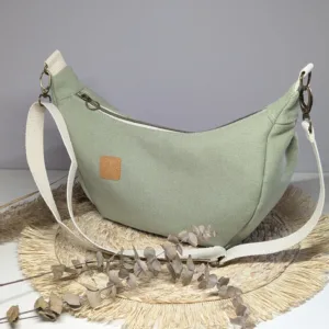 Sac à main demi lune vert Couleur tendance été. Pratique